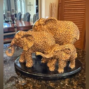 Elegant Gold Elephant Family Sculpture